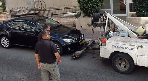 צפו בתמונות: כך יעשה לרכב שבעליו לא שילם חוב...