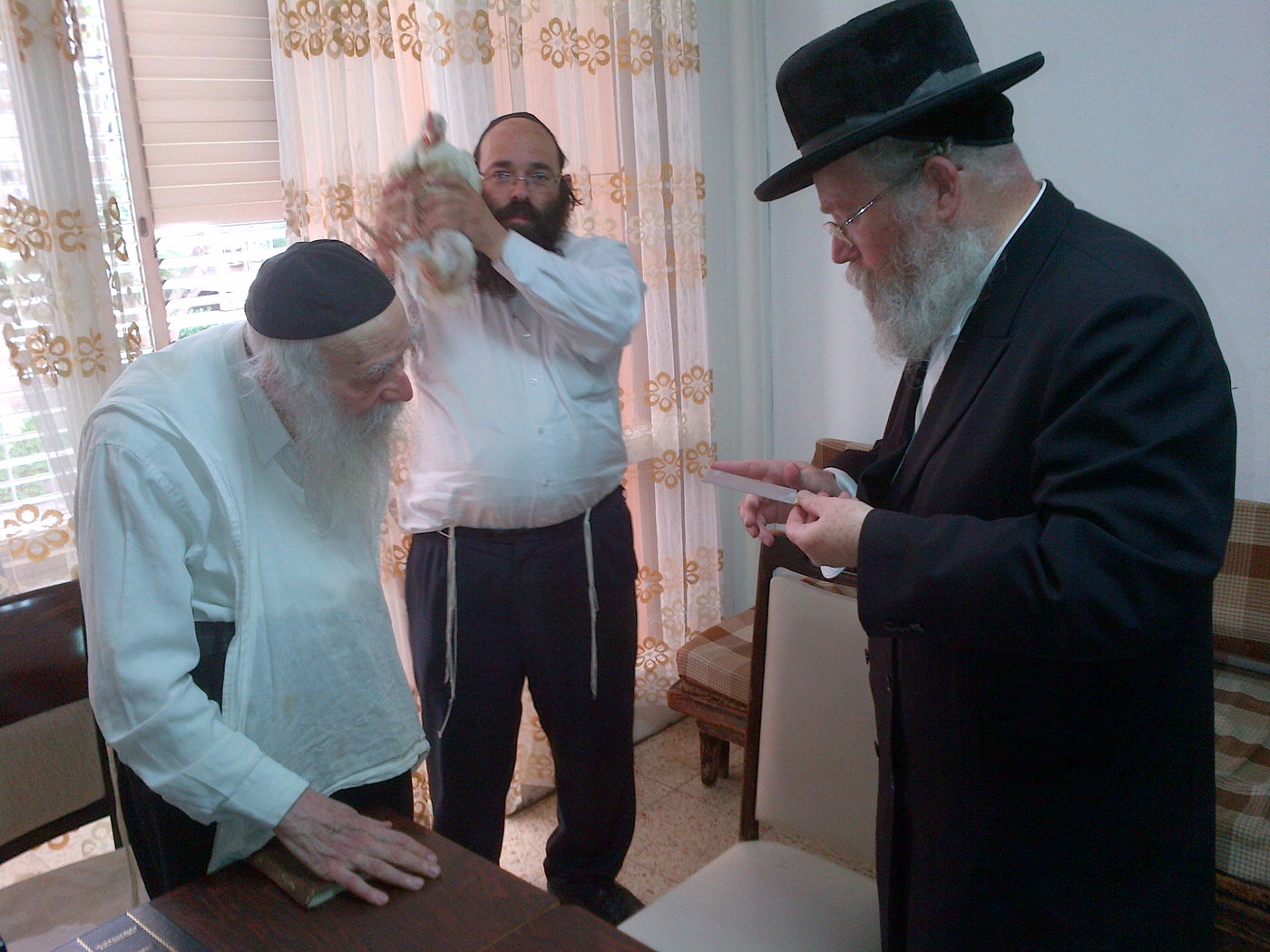 כפרות, שחיטה וכיסוי הדם אצל רבי ניסים קרליץ