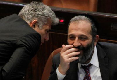 גלריה: מליאת הכנסת בעת השתלחות לפיד בחרדים