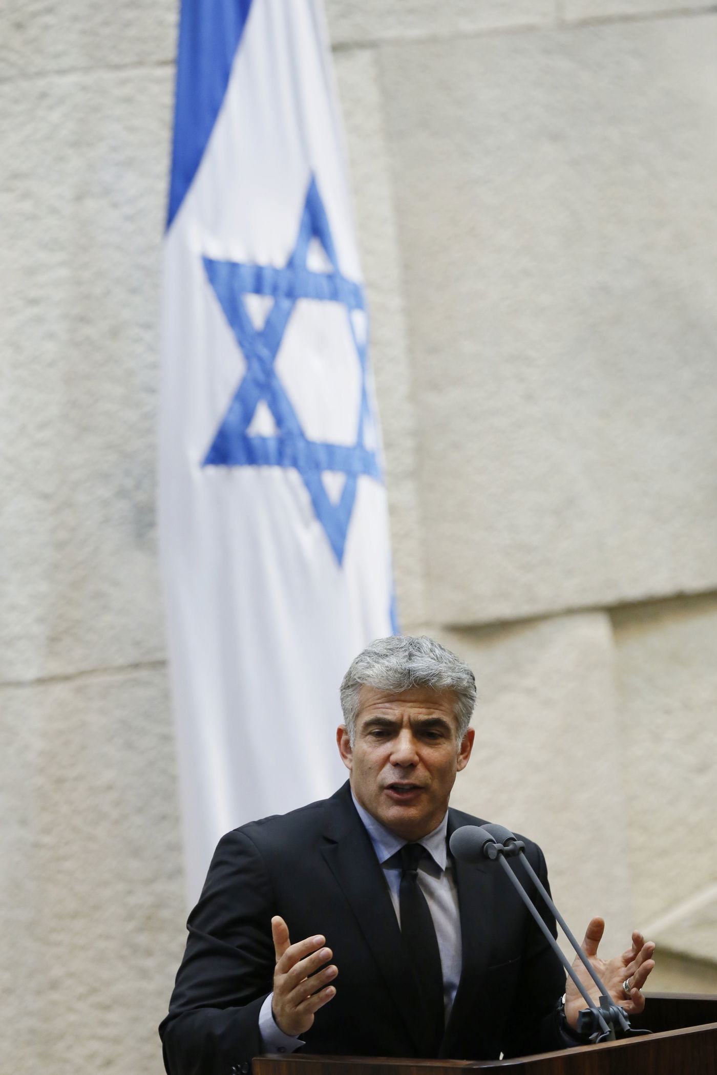 גלריה: מליאת הכנסת בעת השתלחות לפיד בחרדים