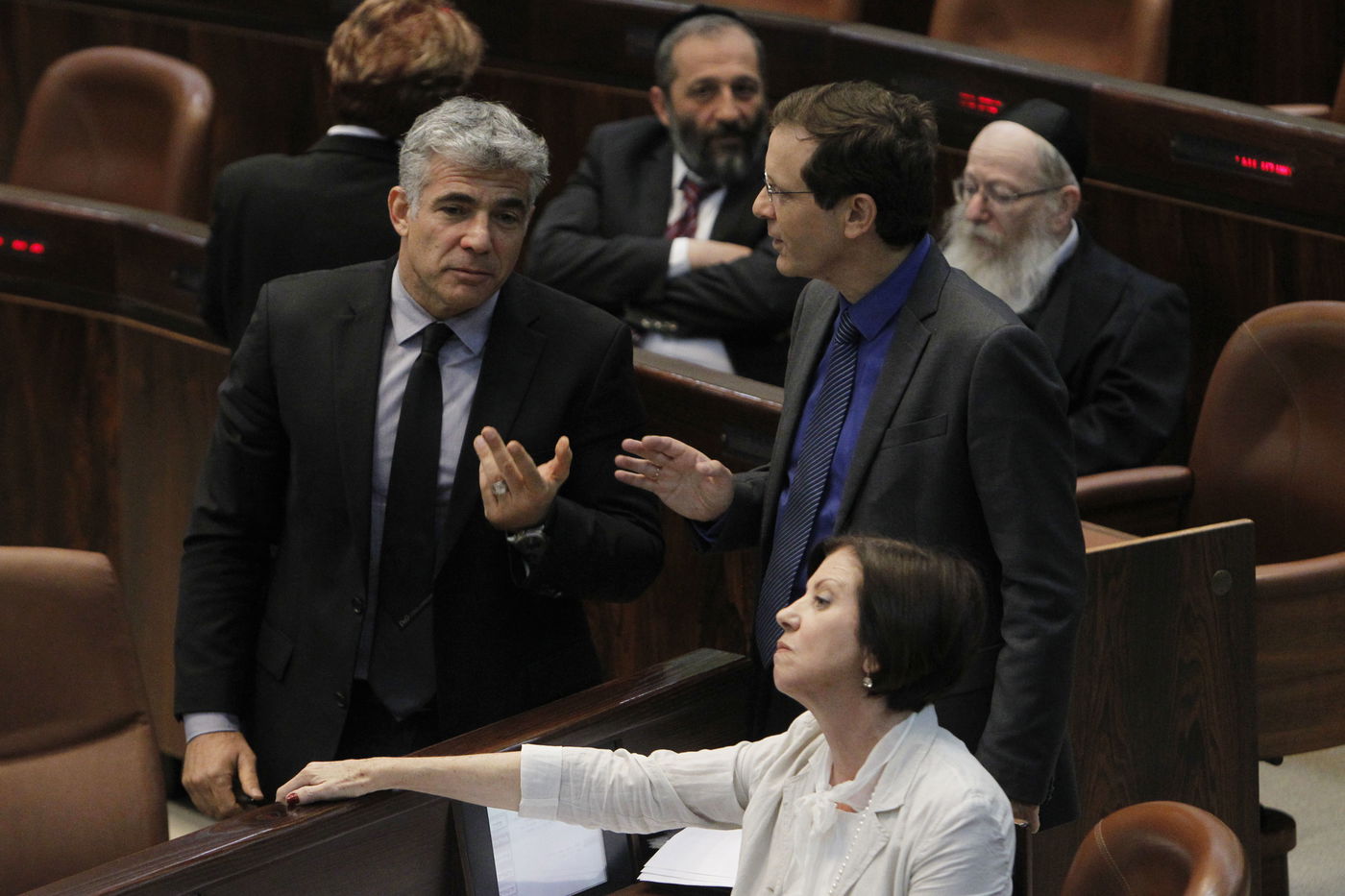 גלריה: מליאת הכנסת בעת השתלחות לפיד בחרדים