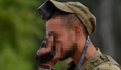 חייל צה"ל לפני היציאה לקרב בעזה