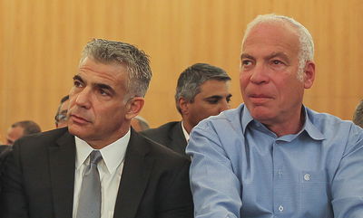 פעלו לקידום החוק. אורי אריאל ויאיר לפיד