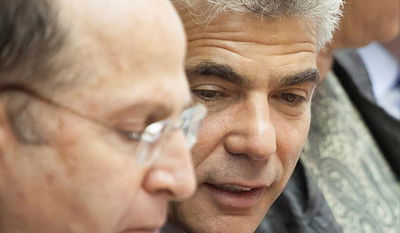 שר האוצר יאיר לפיד ושר הביטחון משה (בוגי) יעלון