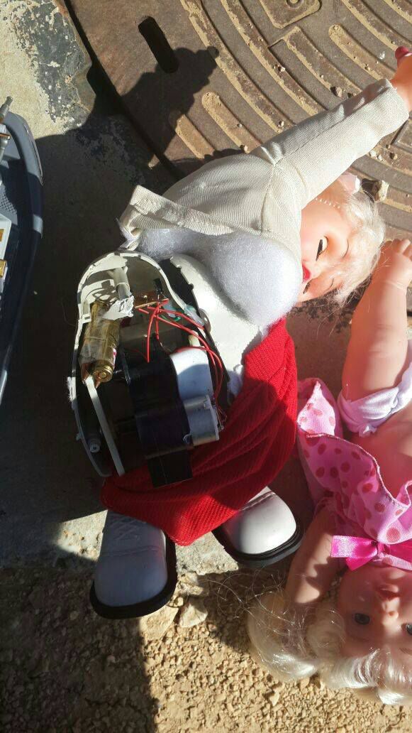 נתב"ג: ניסה להבריח אקדח בבובה