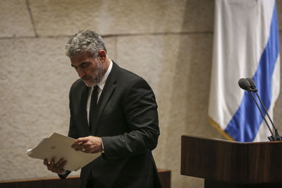 שר האוצר לפיד במליאת הכנסת, אתמול