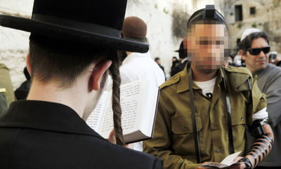 "נאצי" ויריקות: חייל חרדי תיעד תקיפה במאה שערים