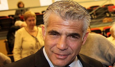 לפיד טוען: "לא התעקשנו על סנקציות פליליות בחוק הגיוס". ומה האמת?