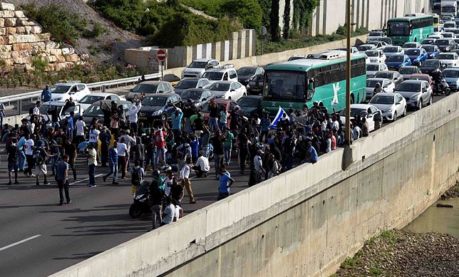 האתיופים חוסמים את נתיבי איילון בהפגנה הקודמת