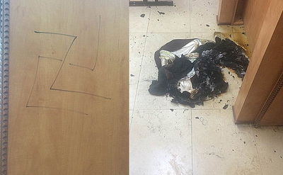 אלמונים שרפו פרוכת וריססו 'צלב קרס' על ארון הקודש