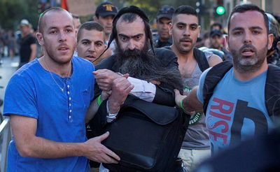 ישי שליסל לאחר הרצח במצעד