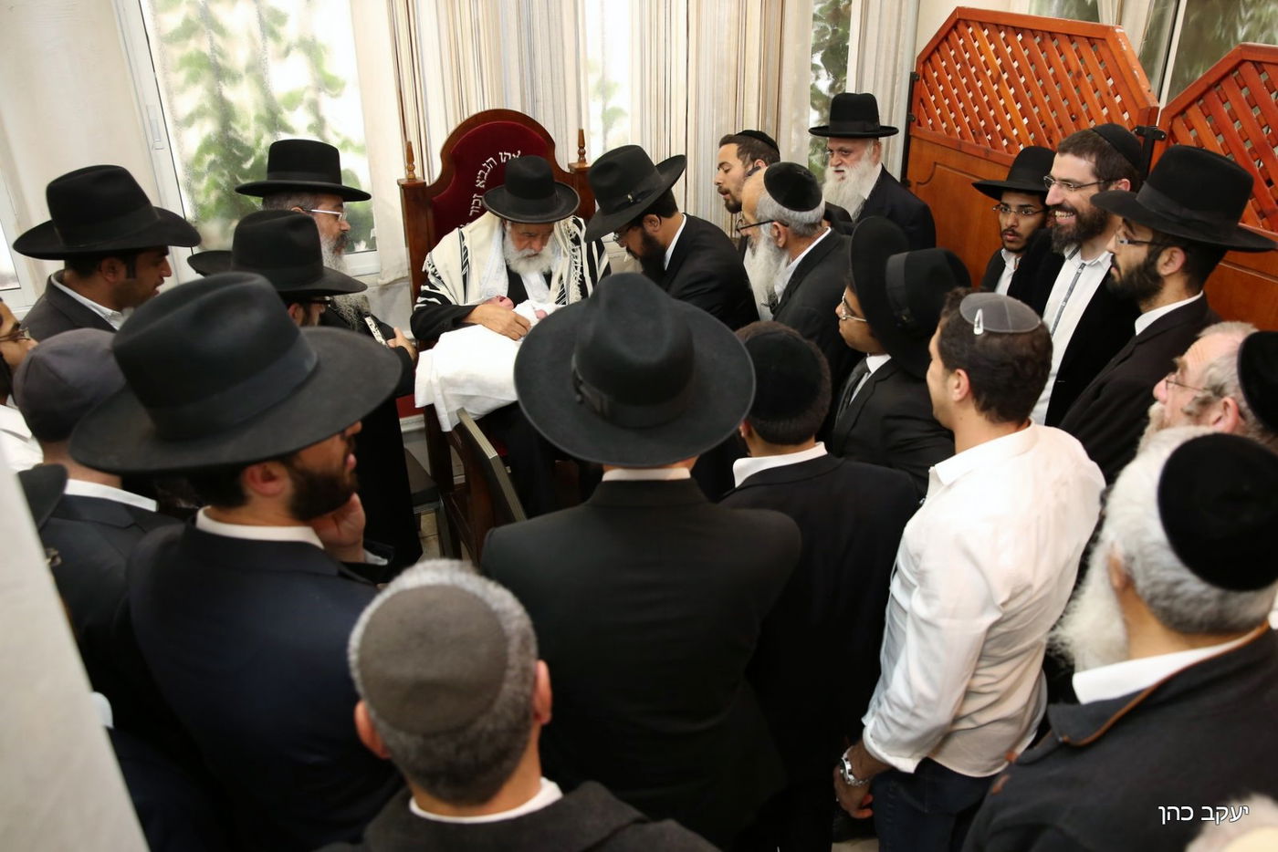 כשהמוהל המפורסם ישב סנדק בברית • גלריה