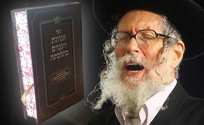 הרב ברלנד לצד הספר השנוי במחלוקת
