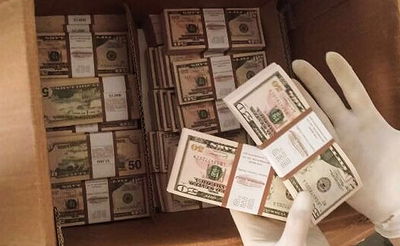 600 אלף דולרים מזויפים נתפסו בדירה בחולון