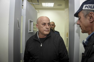 הנאשם, בבית המשפט