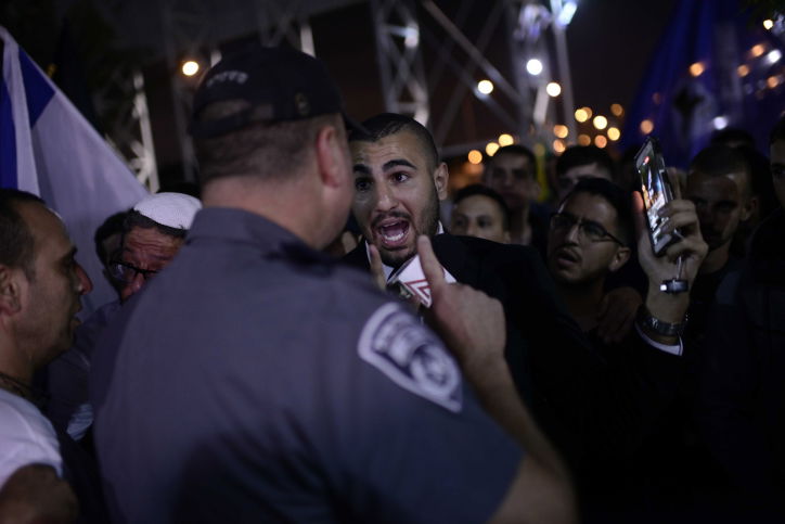 עימותים בטקס זיכרון ישראלי-פלסטיני. צפו