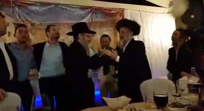 זיץ הושענא רבה עם הרב קלמן גולדשמידט ואברהם פריד