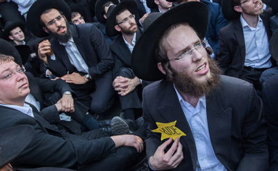 טלאי צהוב ו'בואש' משטרתי: 42 תמונות מהפגנת 'הפלג' בירושלים