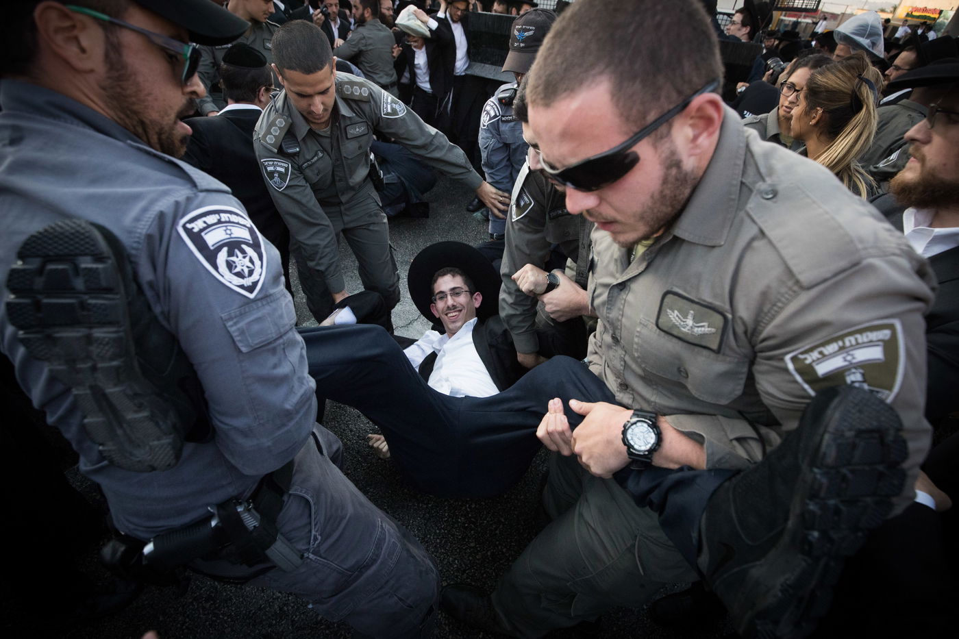 טלאי צהוב ו'בואש' משטרתי: 42 תמונות מהפגנת 'הפלג' בירושלים