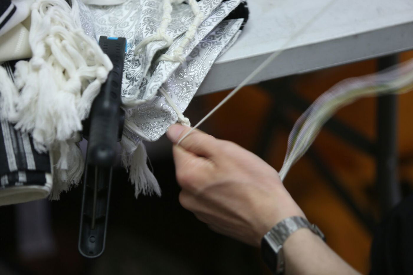 לשם מצווה: כך קושרים ציציות • תיעוד