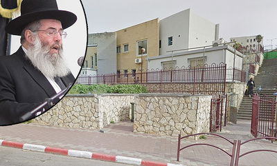 הרב קסלר על רקע בניין החיידר