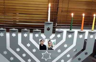 הדלקת נר חנוכה במקום הפיגוע בברקן. צפו