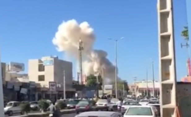 העשן הרב המיתמר ממכונית התופת