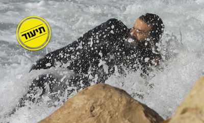 קידוש ה': החרדי קפץ למים עם החליפה - והציל את הגולש