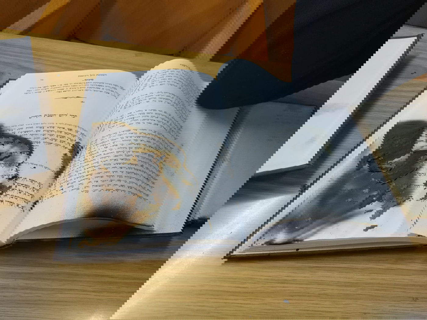 נעצרה חשודה בריסוס גרפיטי בבית הכנסת