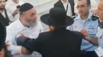 בעצרת: ליצמן כעס ודחף באלימות את איש 'שלומי אמונים'