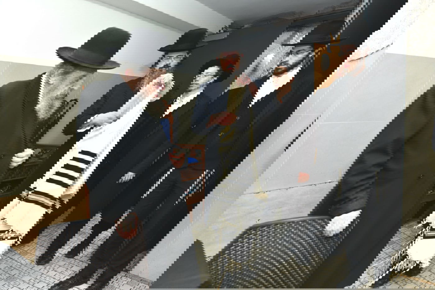 הגר"ד לנדו שימש כסנדק בברית לנין הרב גריינמן