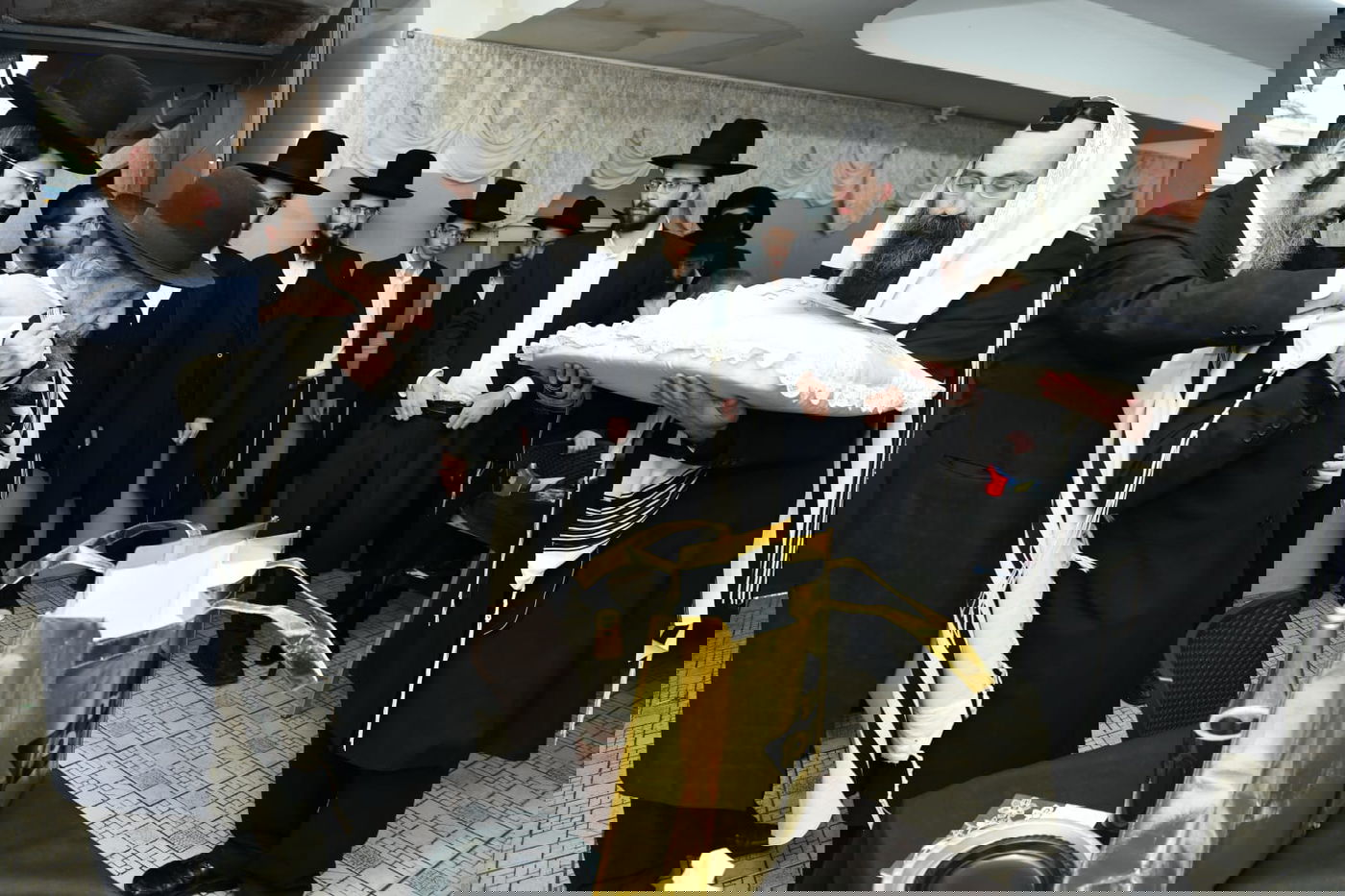 הגר"ד לנדו שימש כסנדק בברית לנין הרב גריינמן