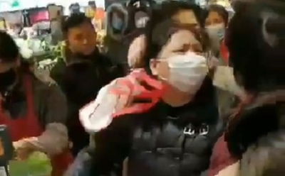 התנפלות אלימה על מדפי המזון בסין, בעקבות ההסגר שהוטל במדינה