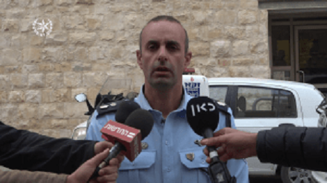 איש משטרה בזירת אירוע. אילוסטרציה