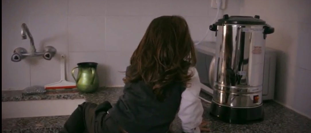 נכוותה בביתה ממיחם, ותקבל 165 אלף ש"ח