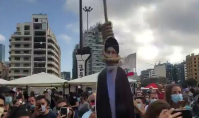 מפגינים 'תלו את נסראללה'; חיזבאללה: 'אין לנו נשק בנמל'