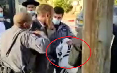 מח"ש חוקרת: התמגן בטלית ולא במסכה - ונעצר באלימות