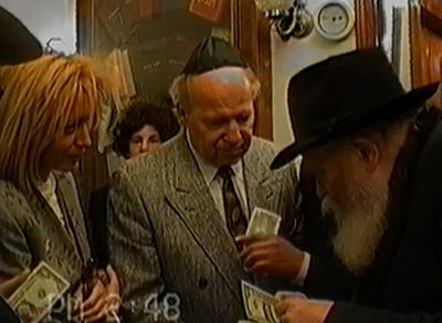 בני הזוג אדלסון עם הרבי מליובאוויטש