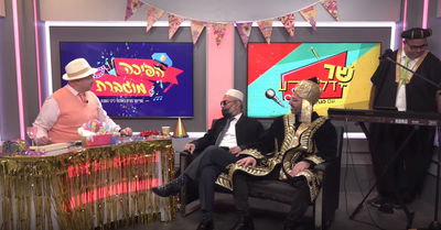 חאפלה פורימית: מנחם טוקר חוגג פורים עם משה אבוטבול