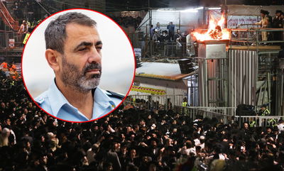 ניצב לביא בתדרוך, היום, ברקע החגיגות בציון הרשב"י