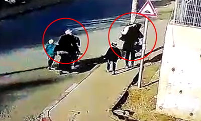 המחבלת צועדת ליד האמא וילדיה, רגע לפני הפיגוע