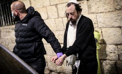 החשוד משה איראם, בעת מעצרו