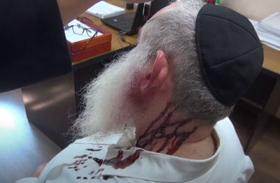 השוטר יורי טקאץ', מחופש לרב ה'נרצח'