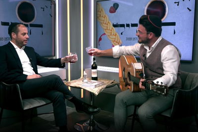 שמעון ברייטקופף לצד המראיין זלמן שטוב