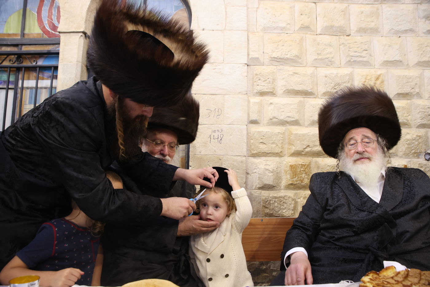 האדמו"ר מספינקא ערך 'חלאקה' לנכדו