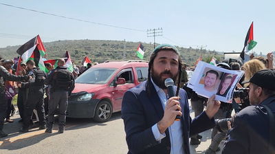 צבי סוכות הציג לשמאל תמונות נרצחים ופצועים מחווארה