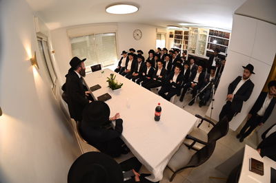 כינוס היסוד ערב חג השבועות בביתו של ראש הישיבה הגר"א מאירוביץ'