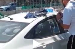 חילוץ ילד מרכב | תמונת ארכיון