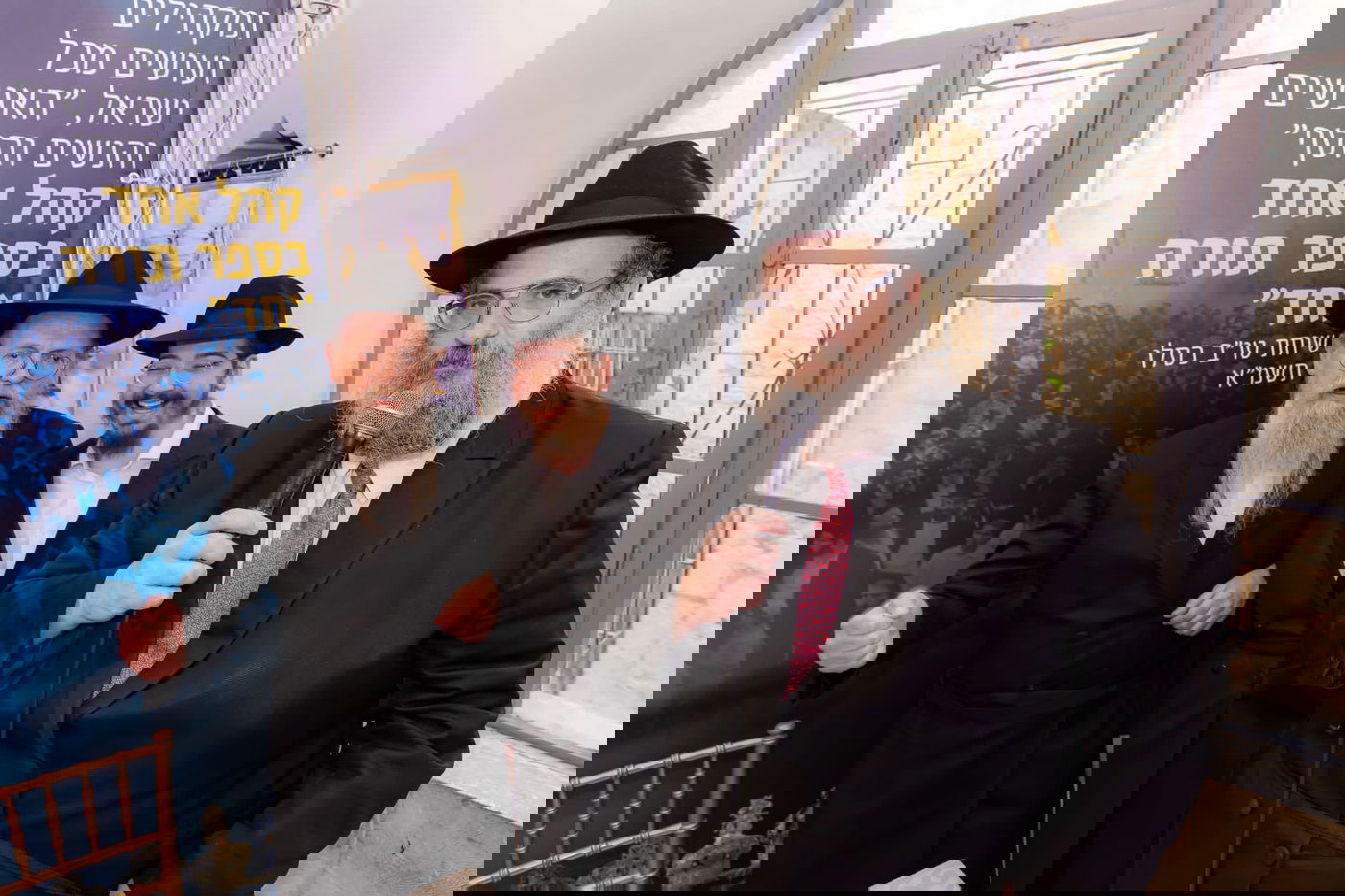 הכנסת ספר תורה הגדולה בעולם: 35,000 חגגו בכותל