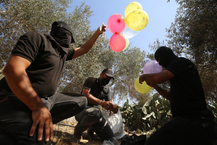 שריפות מבלוני תבערה; צה"ל מתגבר כוחות ליד רצועת עזה